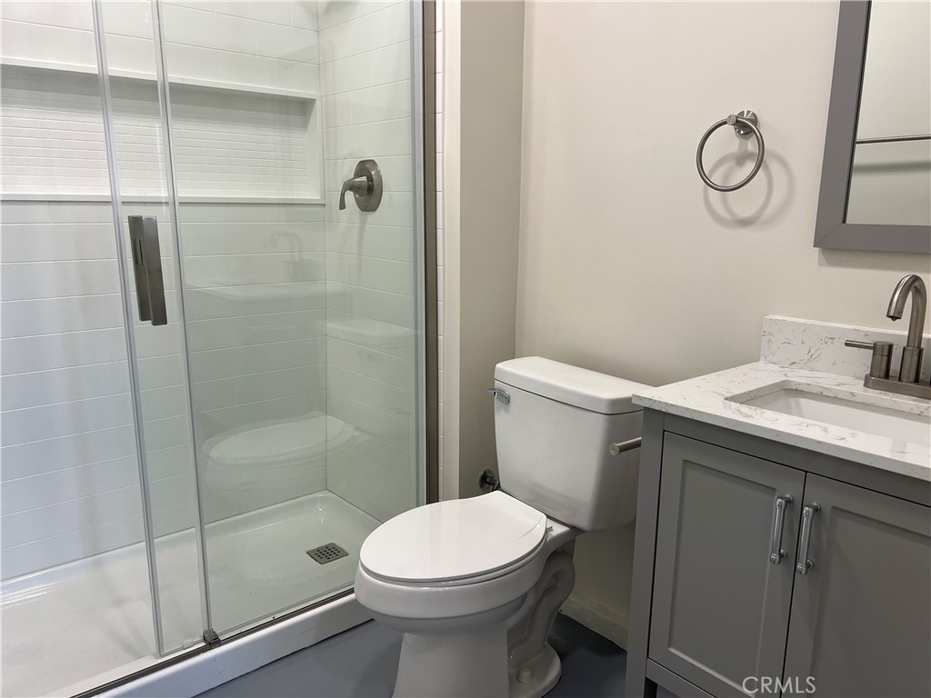 2290 Cogswell Road, Unit B El Monte, CA 91732 - Photo 8 of 12 a bathroom with a sink toilet and shower