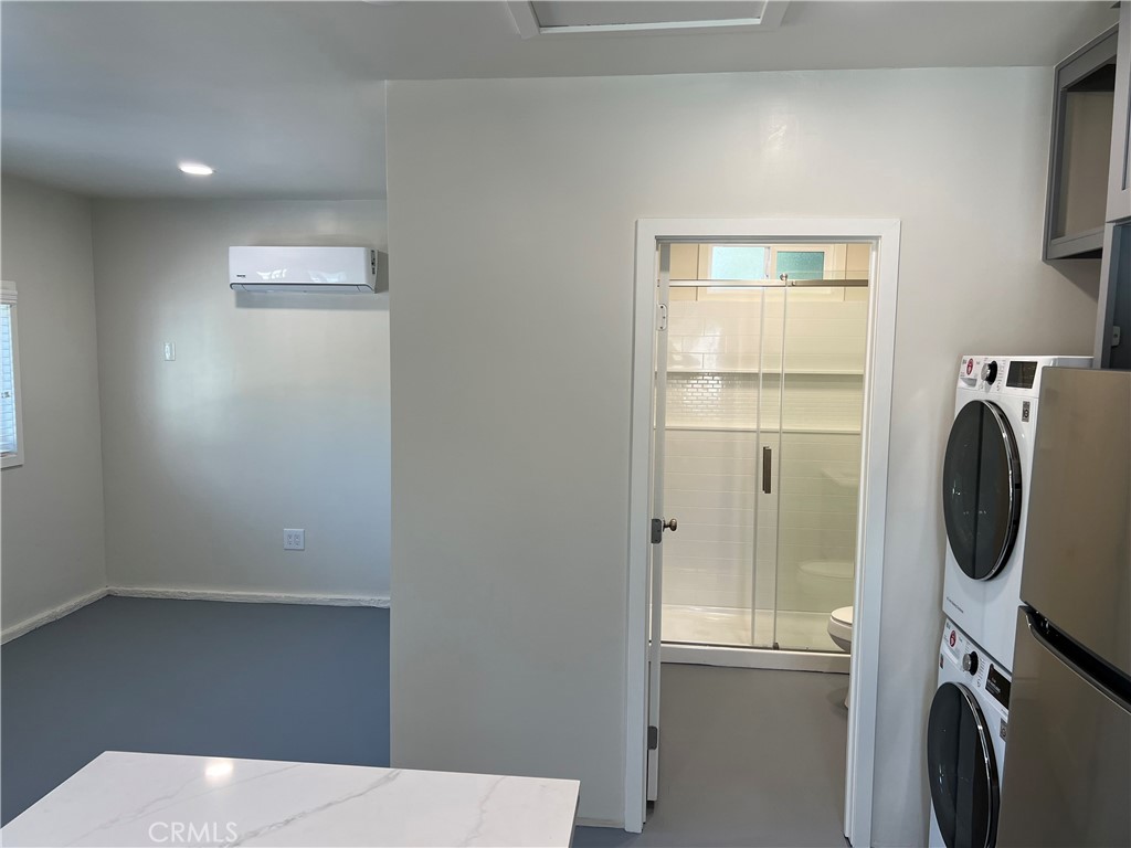 2290 Cogswell Road, Unit B El Monte, CA 91732 - Photo 9 of 12 a room with a washer and dryer