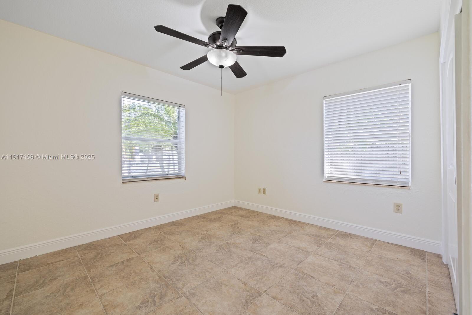 524 Northwest 14th Street Homestead, FL 33030 - Photo 23 of 37 a view of room with a ceiling fan