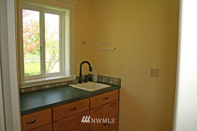 337 Mission Road Walla Walla, WA 99362 - Photo 11 of 23 a kitchen with sink and window