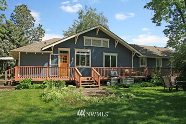 337 Mission Road Walla Walla, WA 99362 - Photo 16 of 23 a view of a house with a yard and furniture