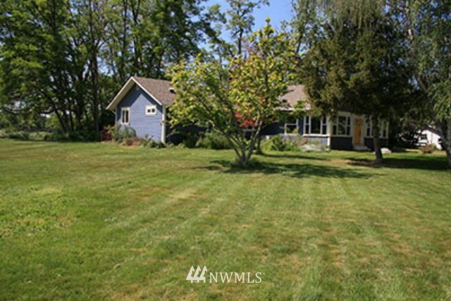 337 Mission Road Walla Walla, WA 99362 - Photo 20 of 23 a front view of a house with a yard and trees