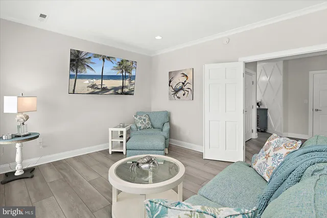 a close view of a vase of flowers sitting on a shelf