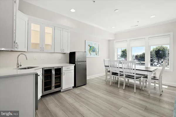 a view of livingroom with furniture and wooden floor