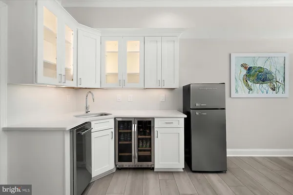 a spacious bedroom with a bed and a couch