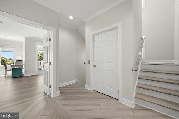a kitchen with stainless steel appliances granite countertop a sink and a stove