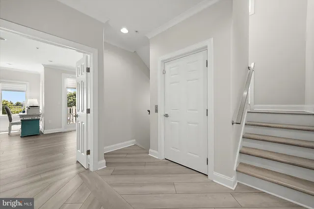 a kitchen with stainless steel appliances granite countertop a sink and a stove