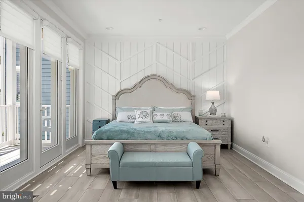 a kitchen with kitchen island granite countertop a stove a sink and a counter space