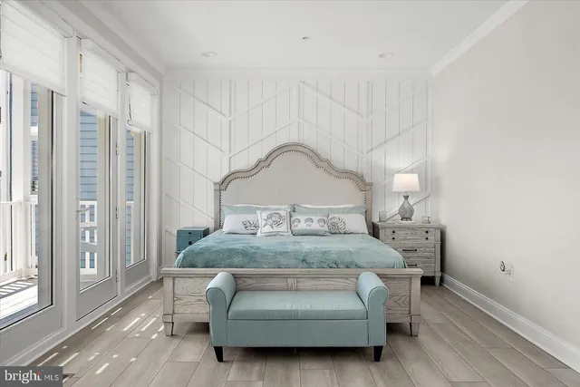 a kitchen with kitchen island granite countertop a stove a sink and a counter space