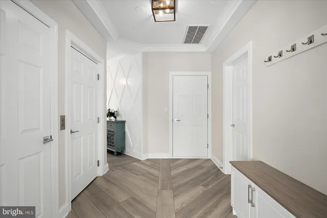 a kitchen with a stove and a refrigerator