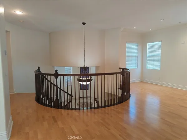 a view of balcony and wooden floor