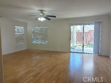a view of balcony with wooden floor
