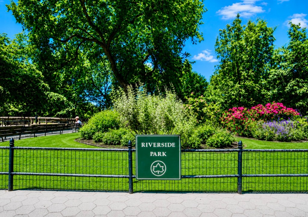 425 Riverside Drive, Unit 6D Manhattan, NY 10025 - Photo 13 of 14 a sign that is sitting on a park