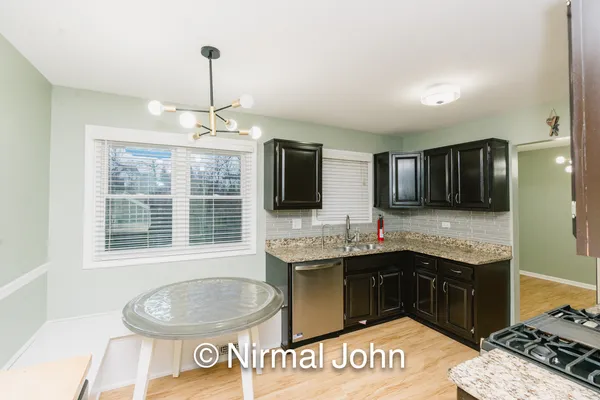 a bathroom with a toilet and a sink
