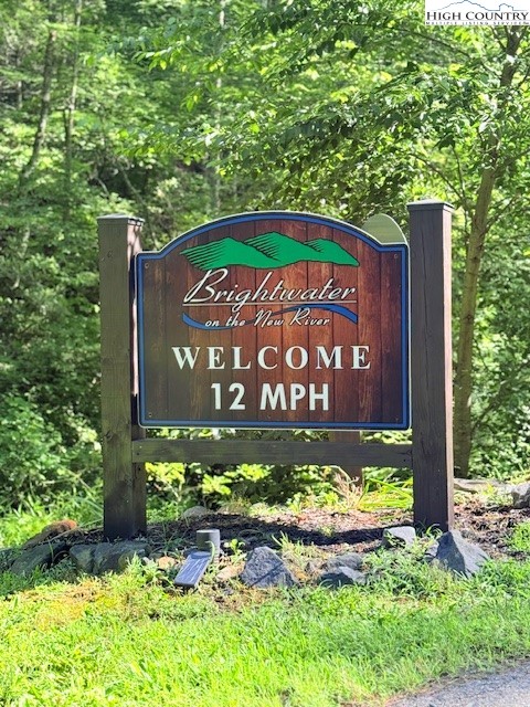 Lot 42 Smoke Rise Path West Jefferson, NC 28694 - Photo 12 of 21 a sign on the side of the road