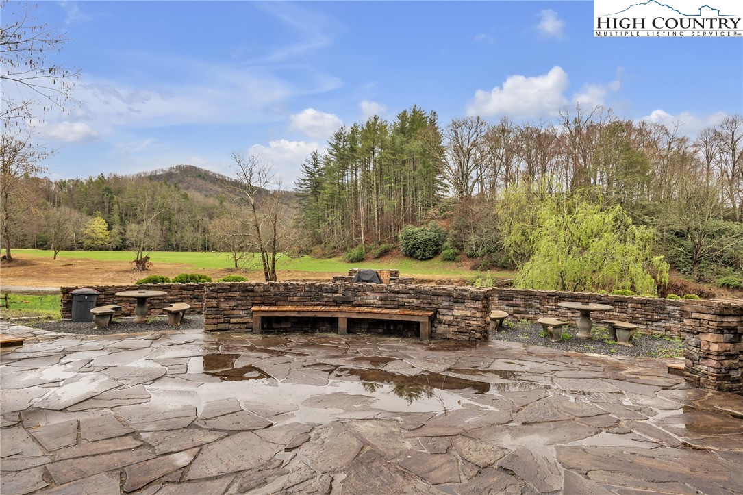 Lot 42 Smoke Rise Path West Jefferson, NC 28694 - Photo 20 of 21 a view of a yard with swimming pool and sitting area