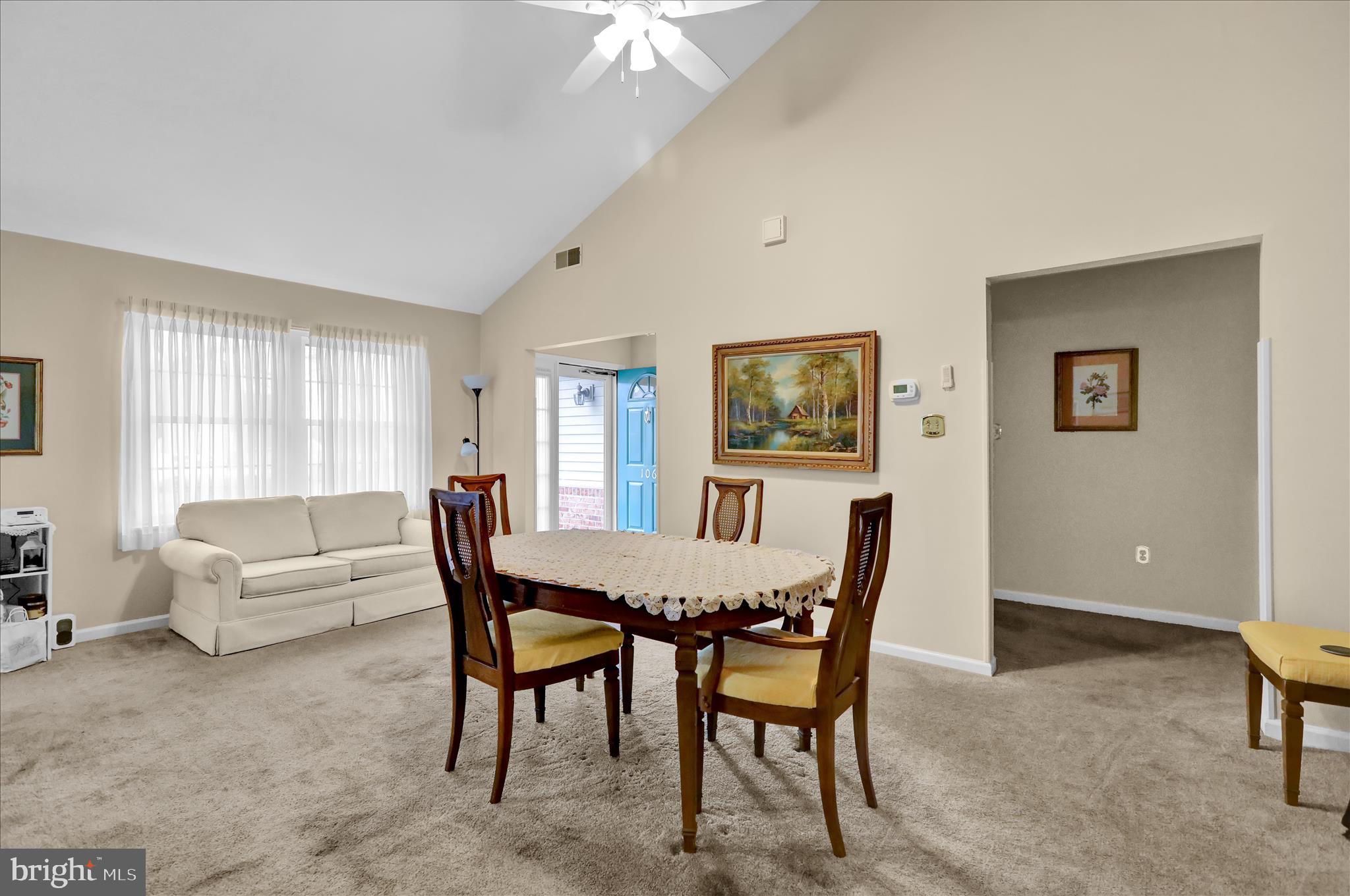 106 Heather Lane Reading, PA 19610 - Photo 8 of 23 a view of a dining room with furniture and a chandelier
