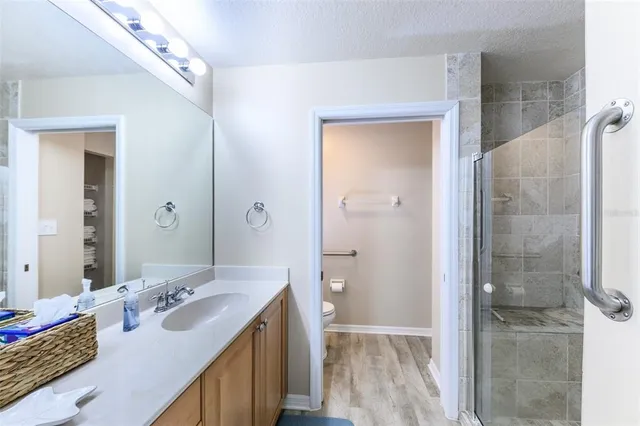 a view of a patio with a table and chairs