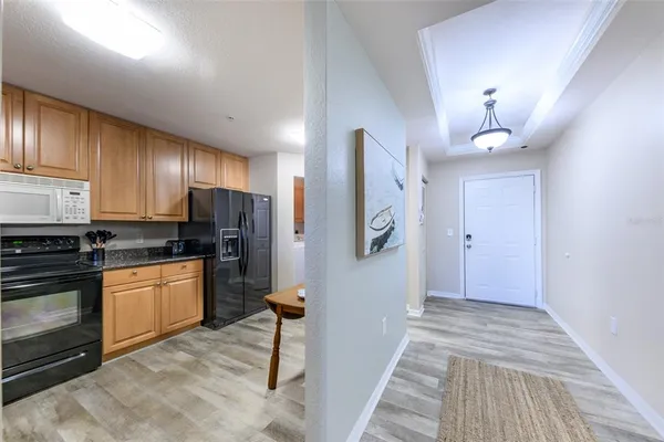 a view of storage and utility room with washer and dryer