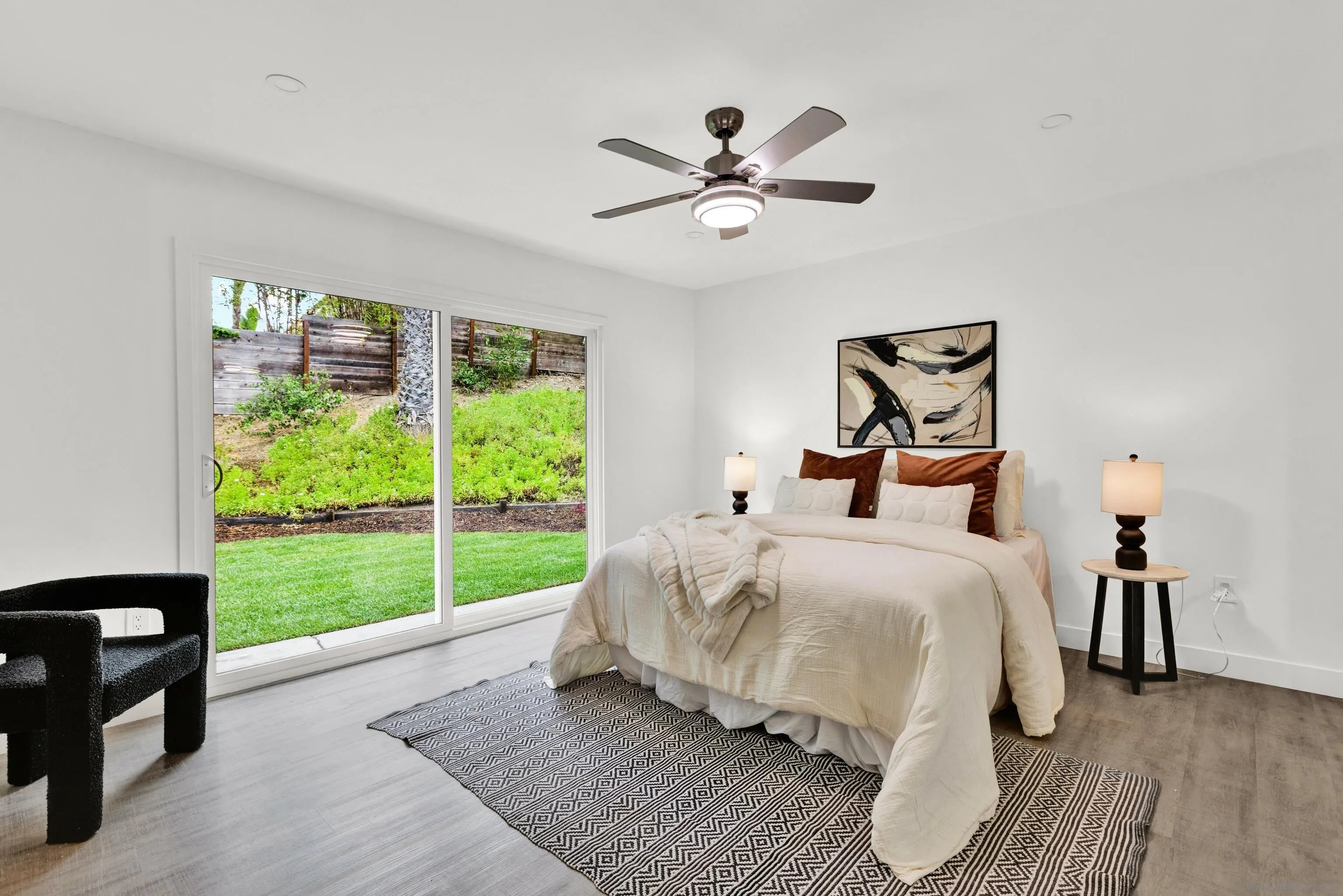 2250 Ivy Road Oceanside, CA 92054 - Photo 15 of 30 a bedroom with a bed and a window