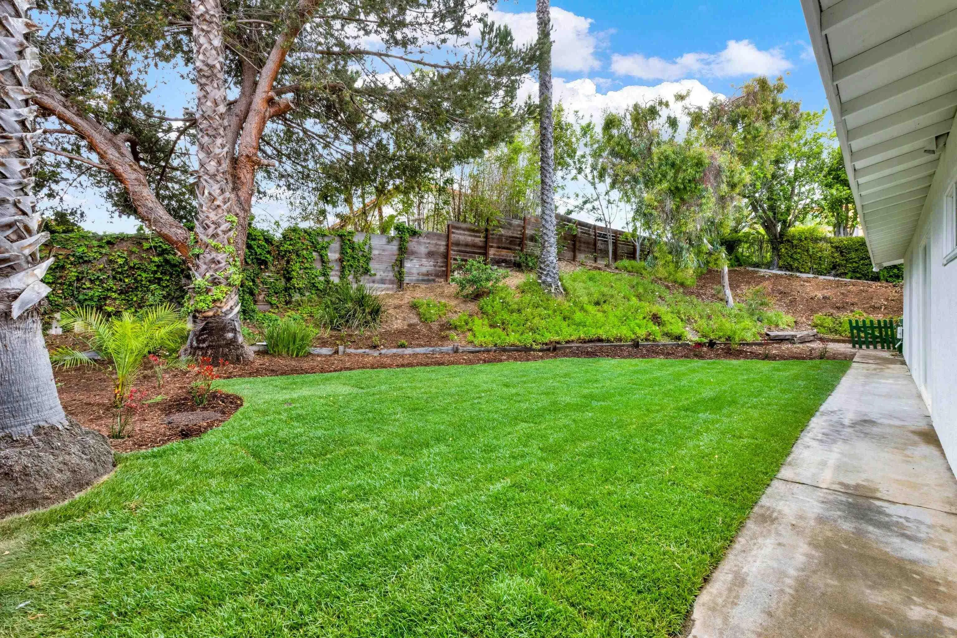 2250 Ivy Road Oceanside, CA 92054 - Photo 16 of 30 a view of a garden with a fountain