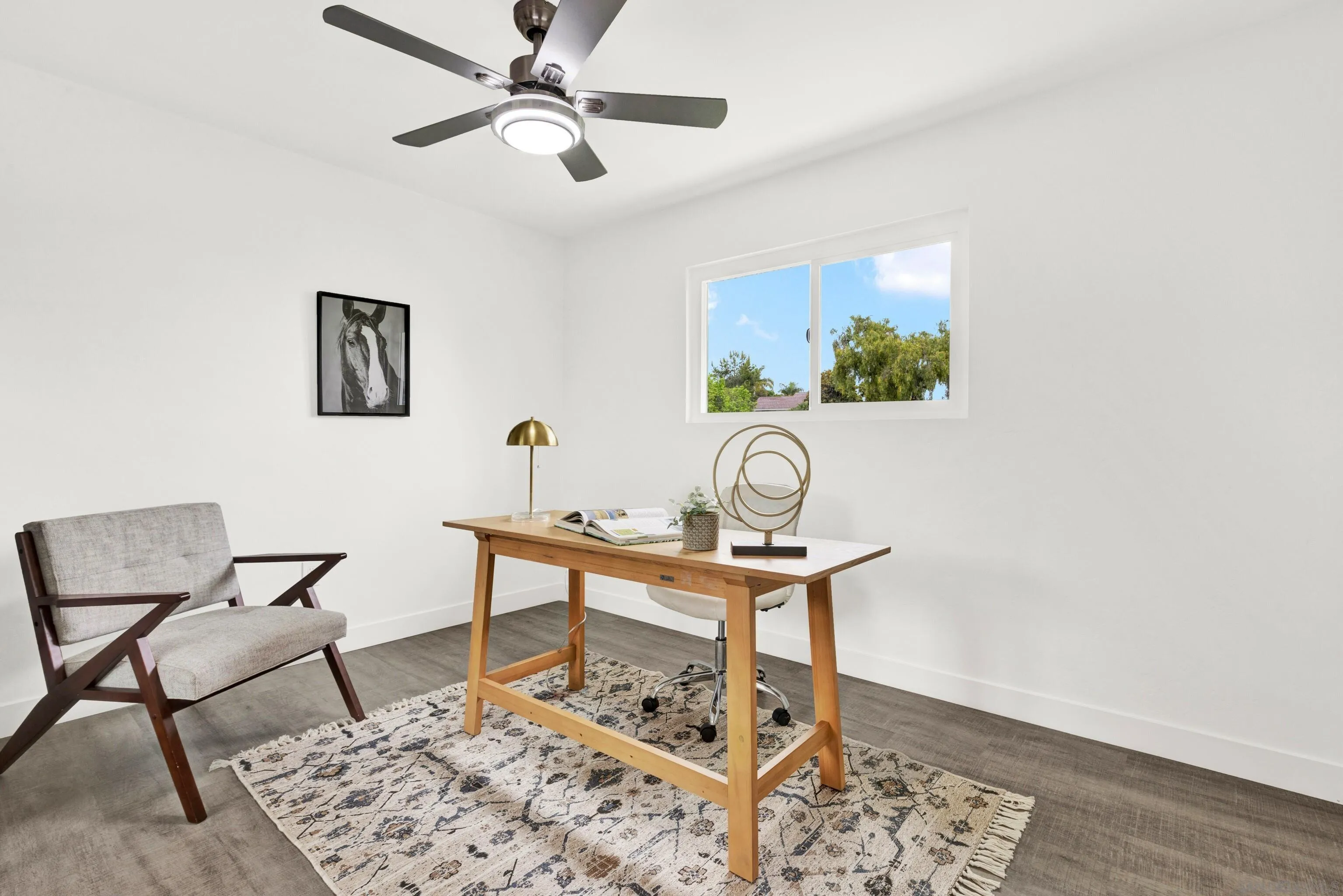 2250 Ivy Road Oceanside, CA 92054 - Photo 19 of 30 a view of a workspace with furniture and wooden floor