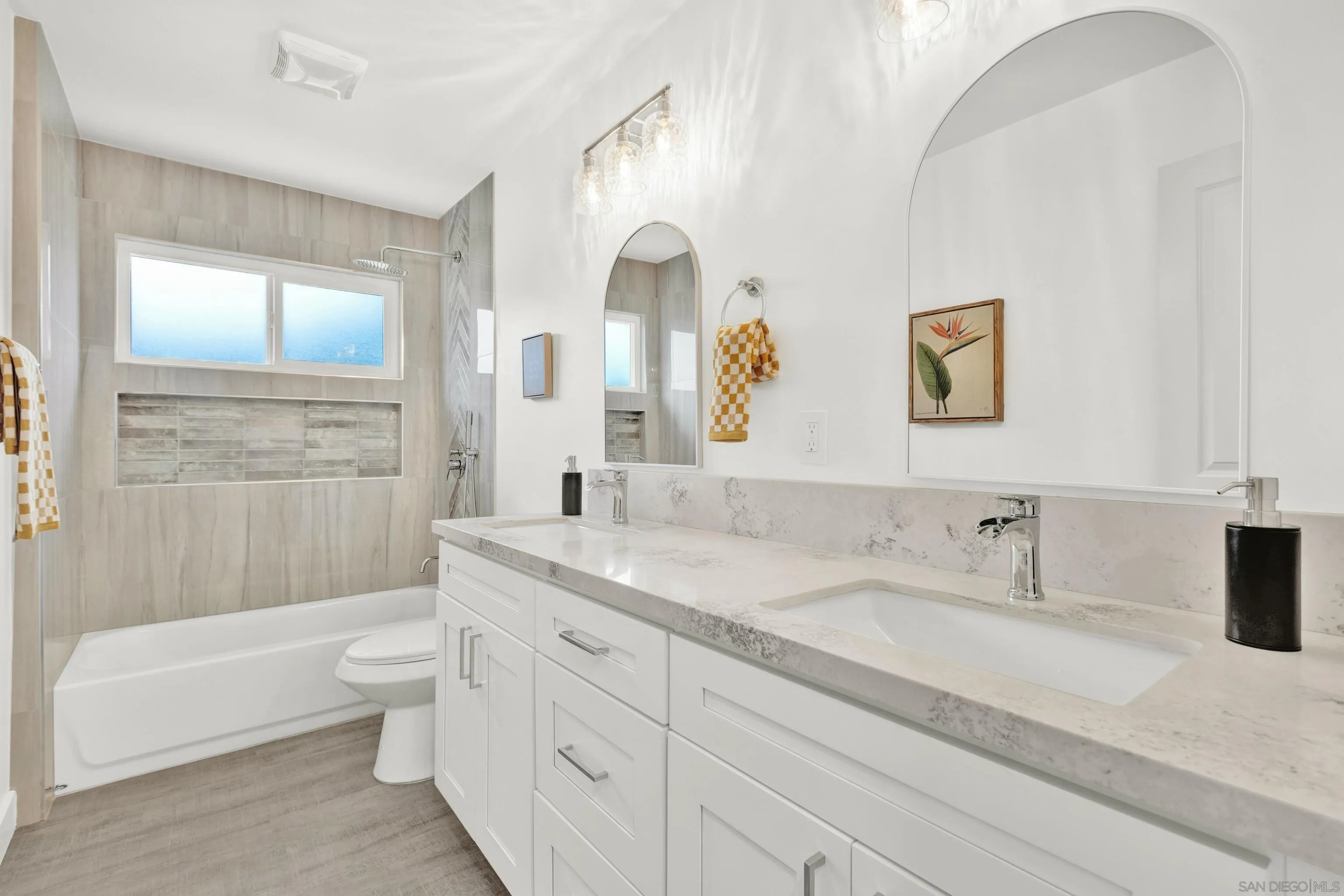 2250 Ivy Road Oceanside, CA 92054 - Photo 23 of 30 a bathroom with a granite countertop sink mirror toilet and bathtub