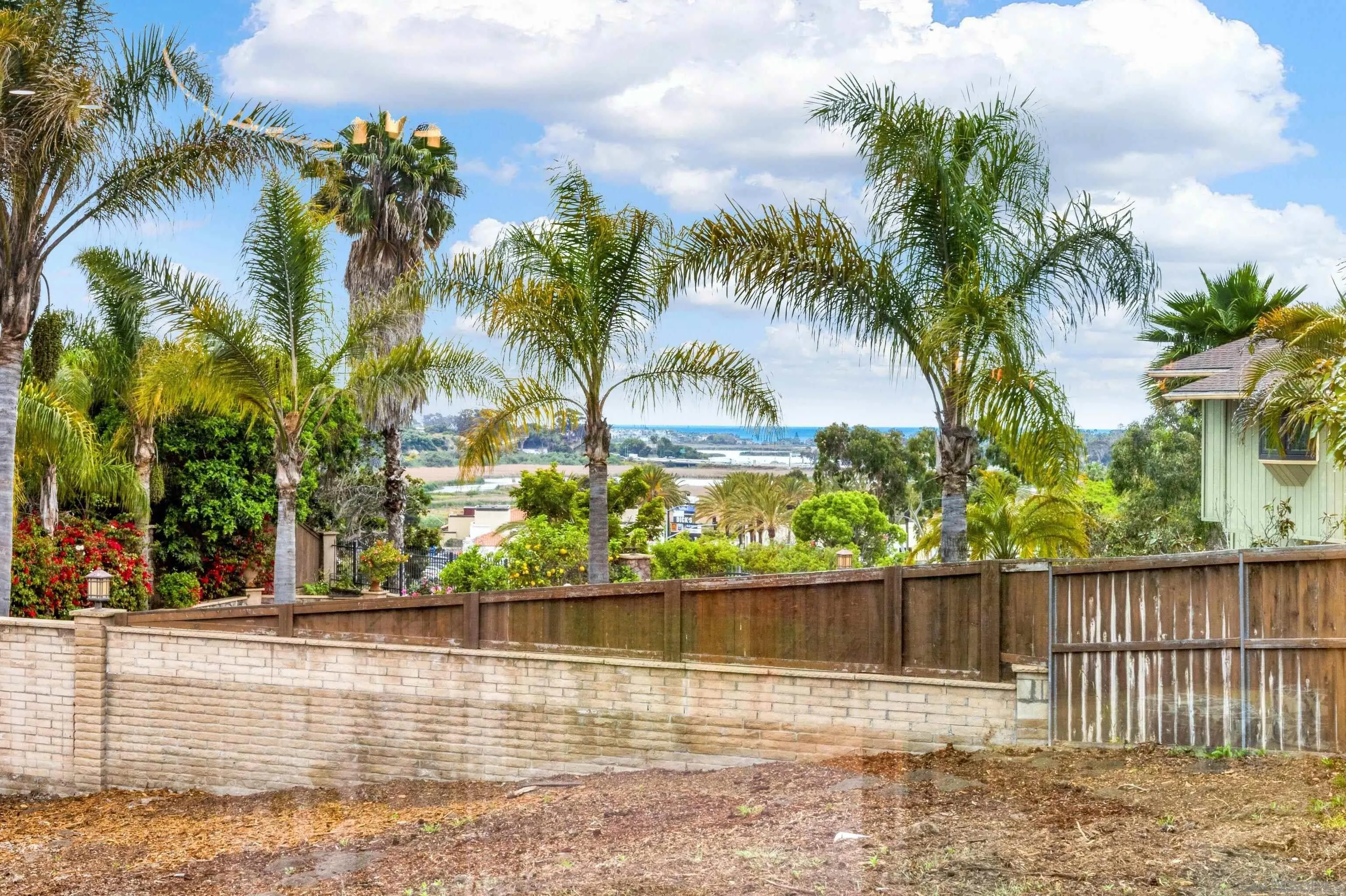 2250 Ivy Road Oceanside, CA 92054 - Photo 6 of 30 a view of a swimming pool with a garden