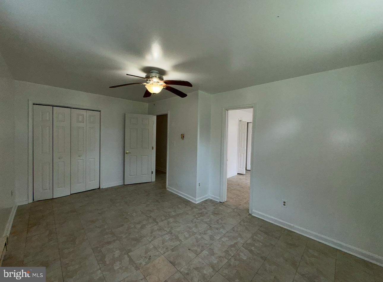 7341 Waldman Avenue Sparrows Point, MD 21219 - Photo 11 of 15 a view of an empty room and a ceiling fan window
