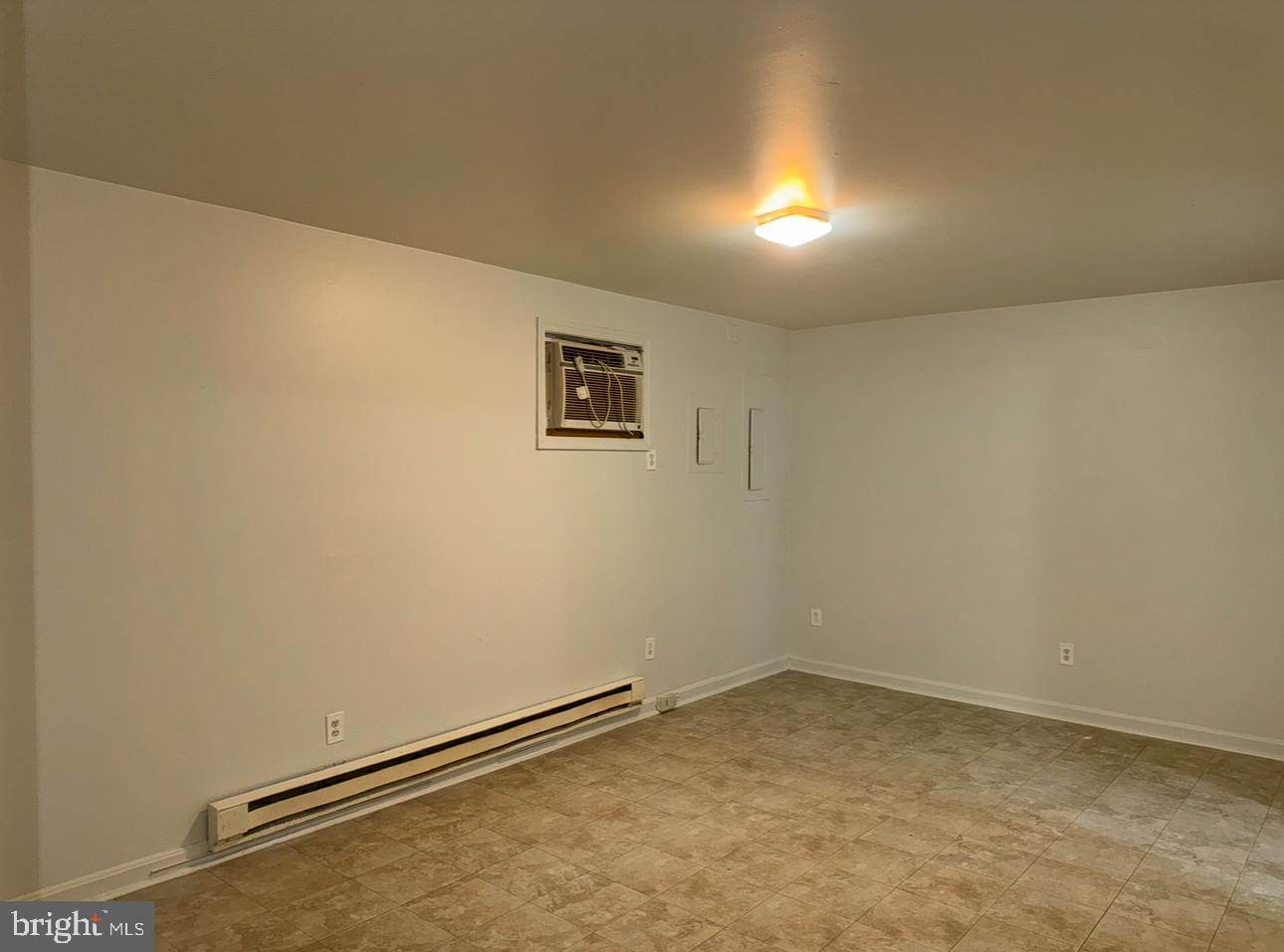 7341 Waldman Avenue Sparrows Point, MD 21219 - Photo 10 of 15 an empty room with a door