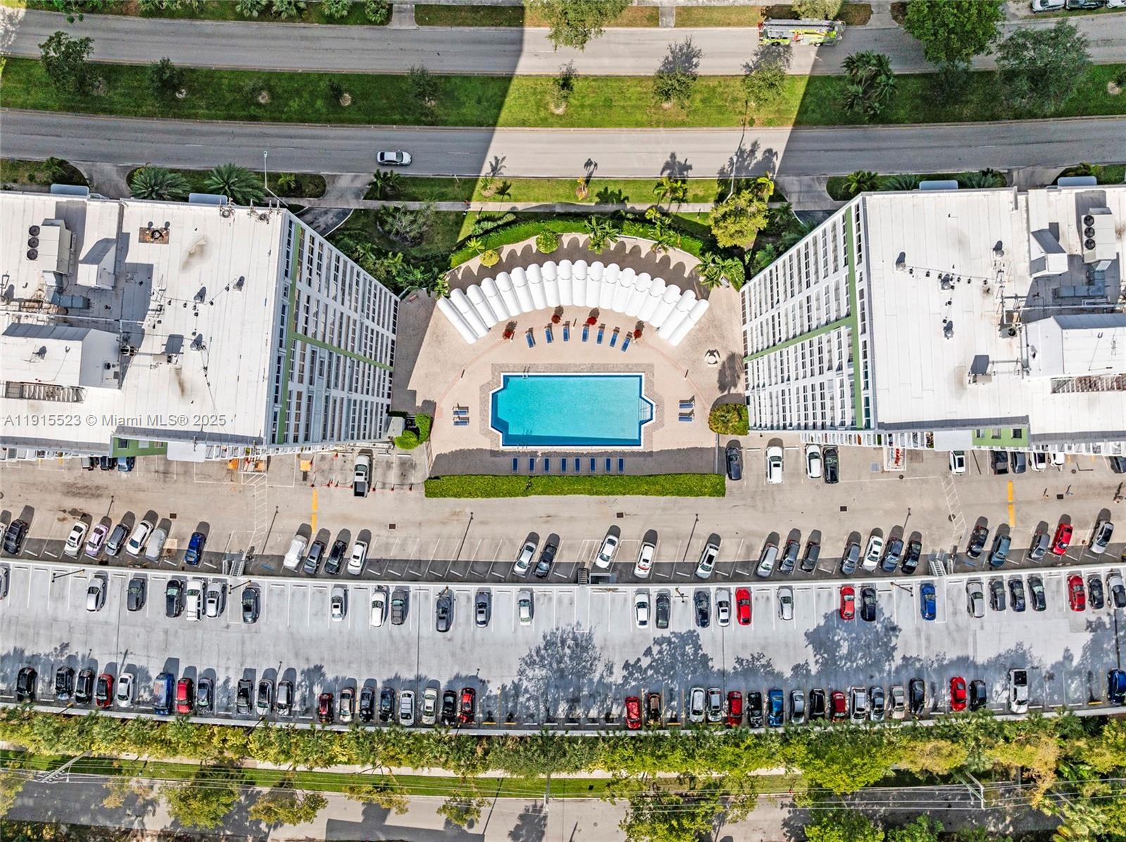 2100 Sans Souci Boulevard, Unit B1006 North Miami, FL 33181 - Photo 26 of 40 a view of a swimming pool and outdoor space