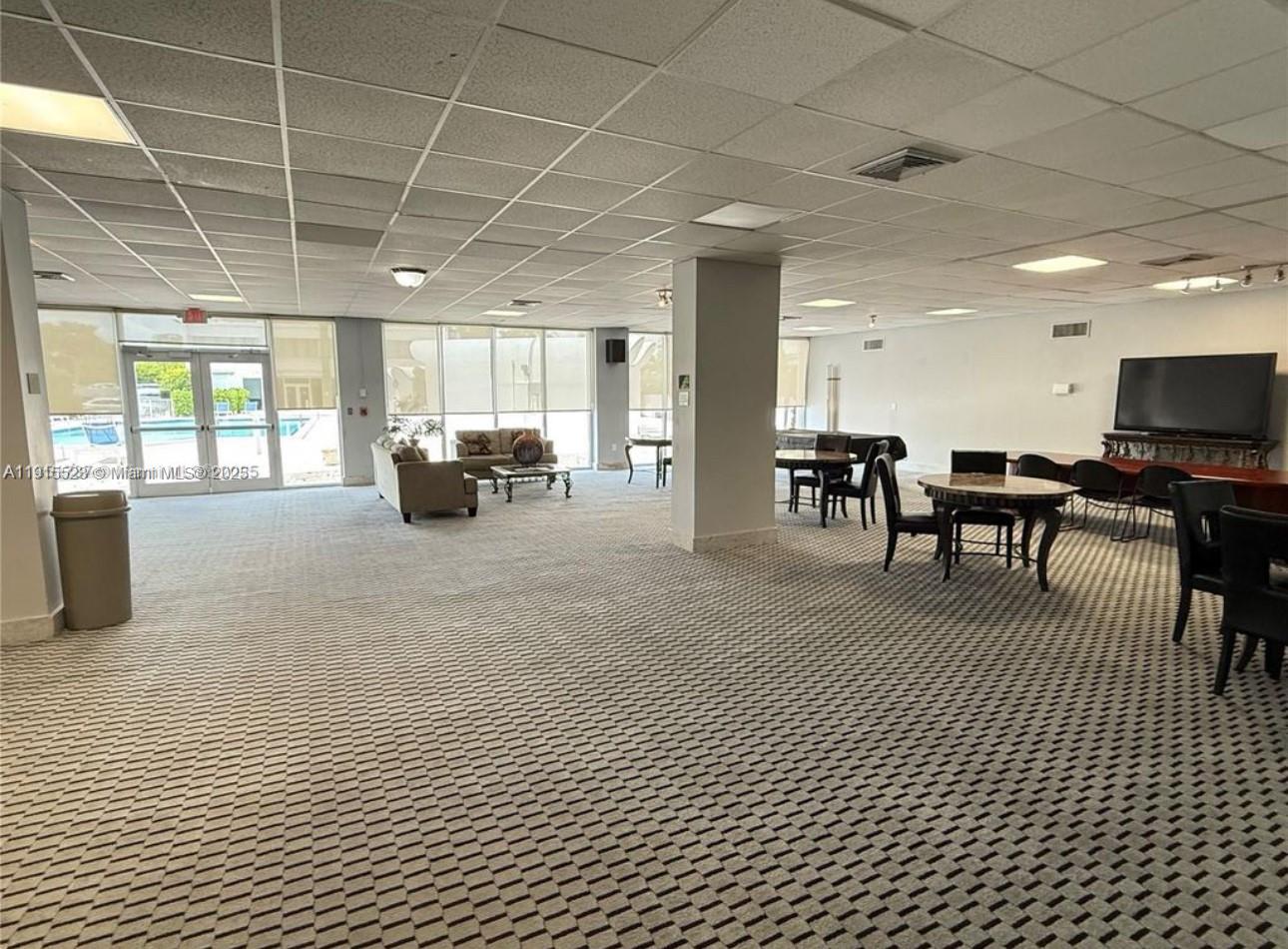 2100 Sans Souci Boulevard, Unit B1006 North Miami, FL 33181 - Photo 37 of 40 a living room with furniture