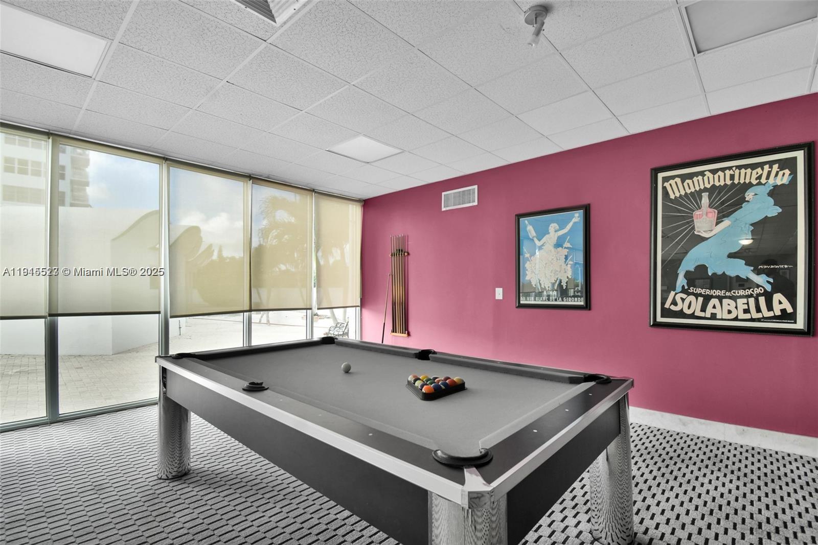 2100 Sans Souci Boulevard, Unit B1006 North Miami, FL 33181 - Photo 38 of 40 a room with pool table and glass door