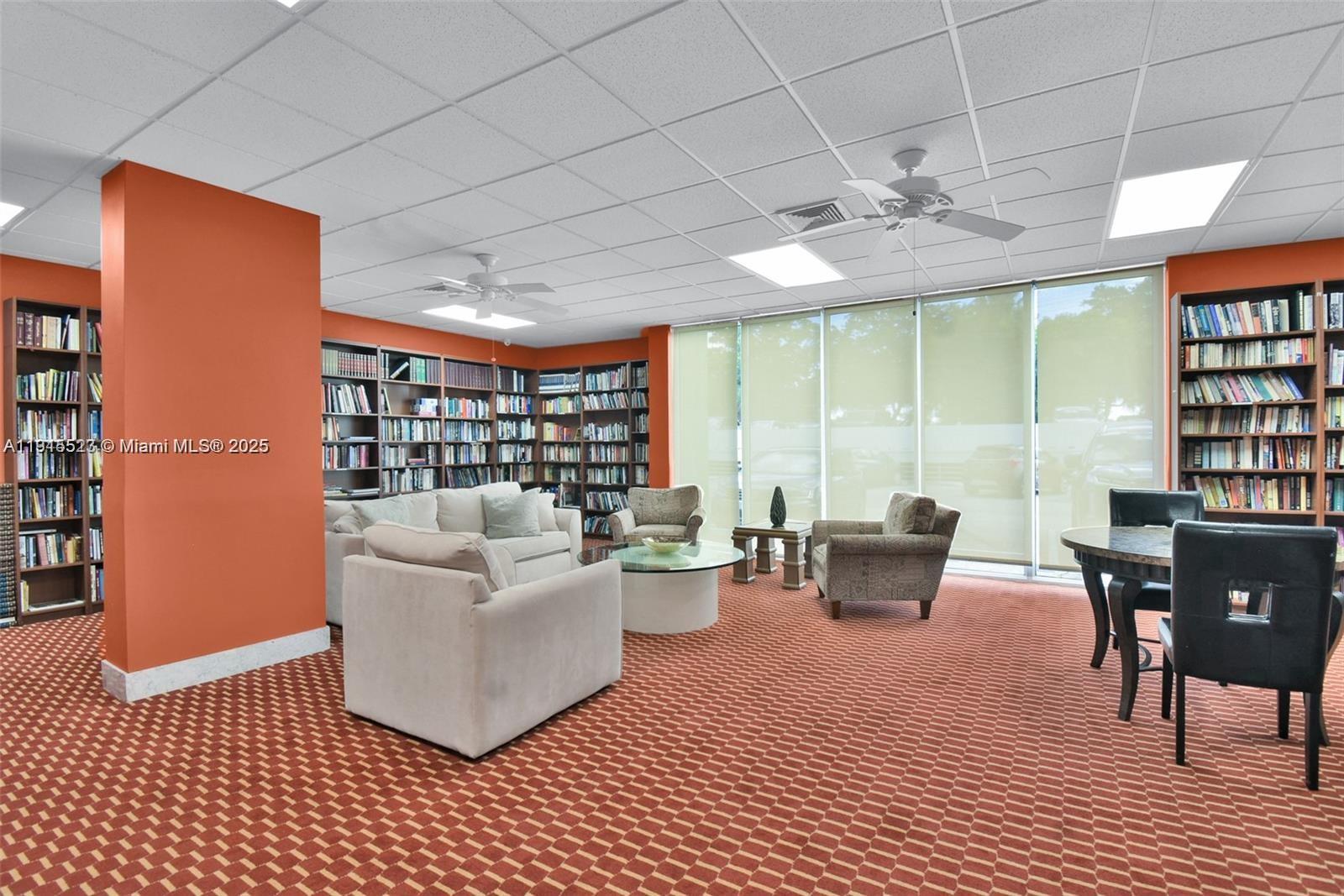 2100 Sans Souci Boulevard, Unit B1006 North Miami, FL 33181 - Photo 40 of 40 a living room with furniture and a large window