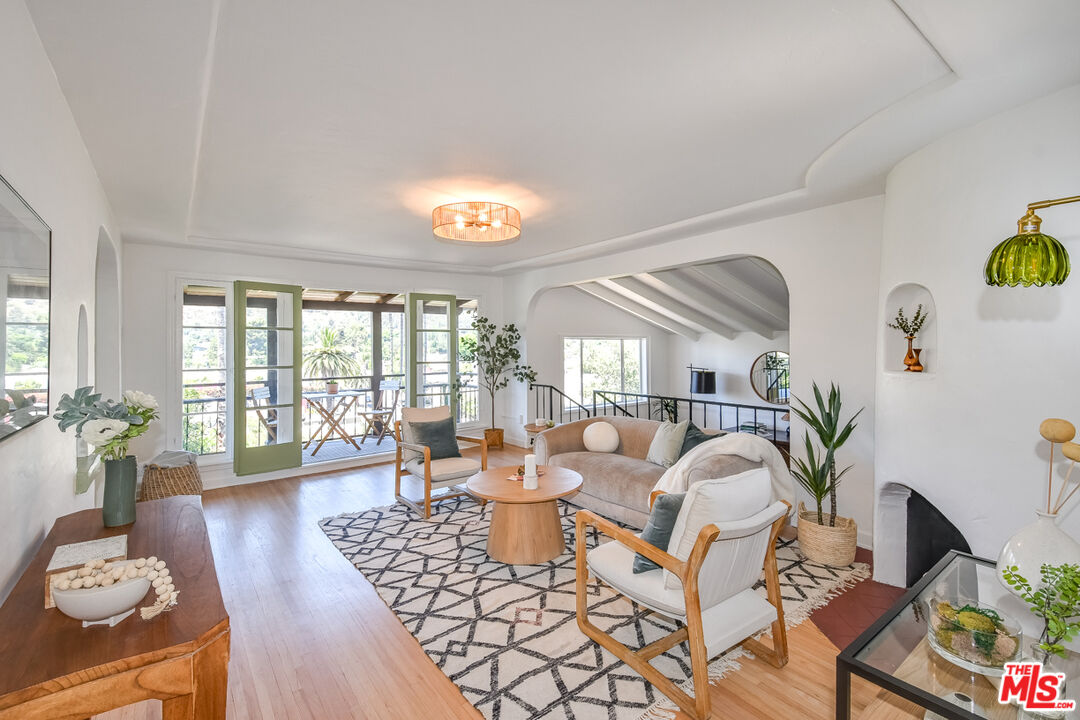1817 Oak Tree Drive Los Angeles, CA 90041 - Photo 2 of 6 a living room with furniture and wooden floor