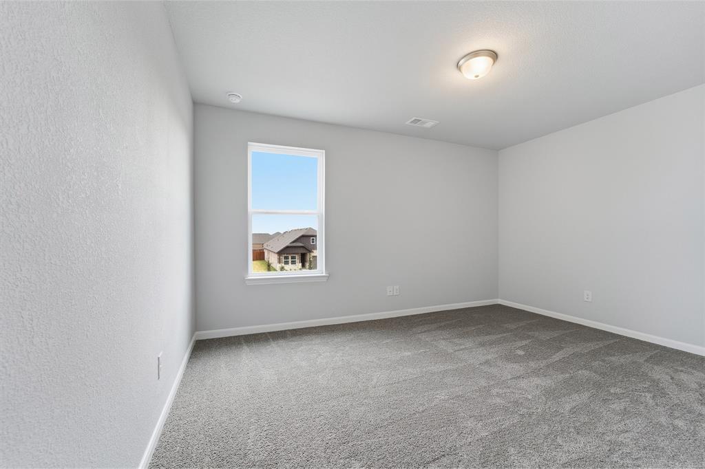 343 Caviar Road Waxahachie, TX 75165 - Photo 20 of 22 an empty room with a window