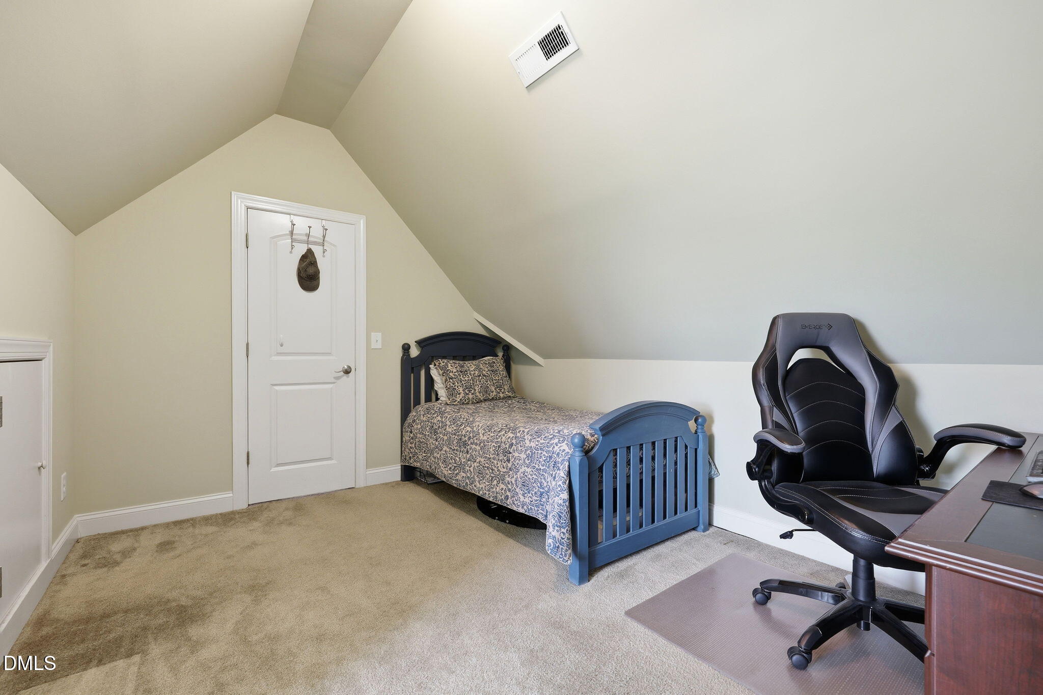 7040 Dayton Ridge Drive Apex, NC 27539 - Photo 26 of 38 a bedroom with a bed a desk and chair