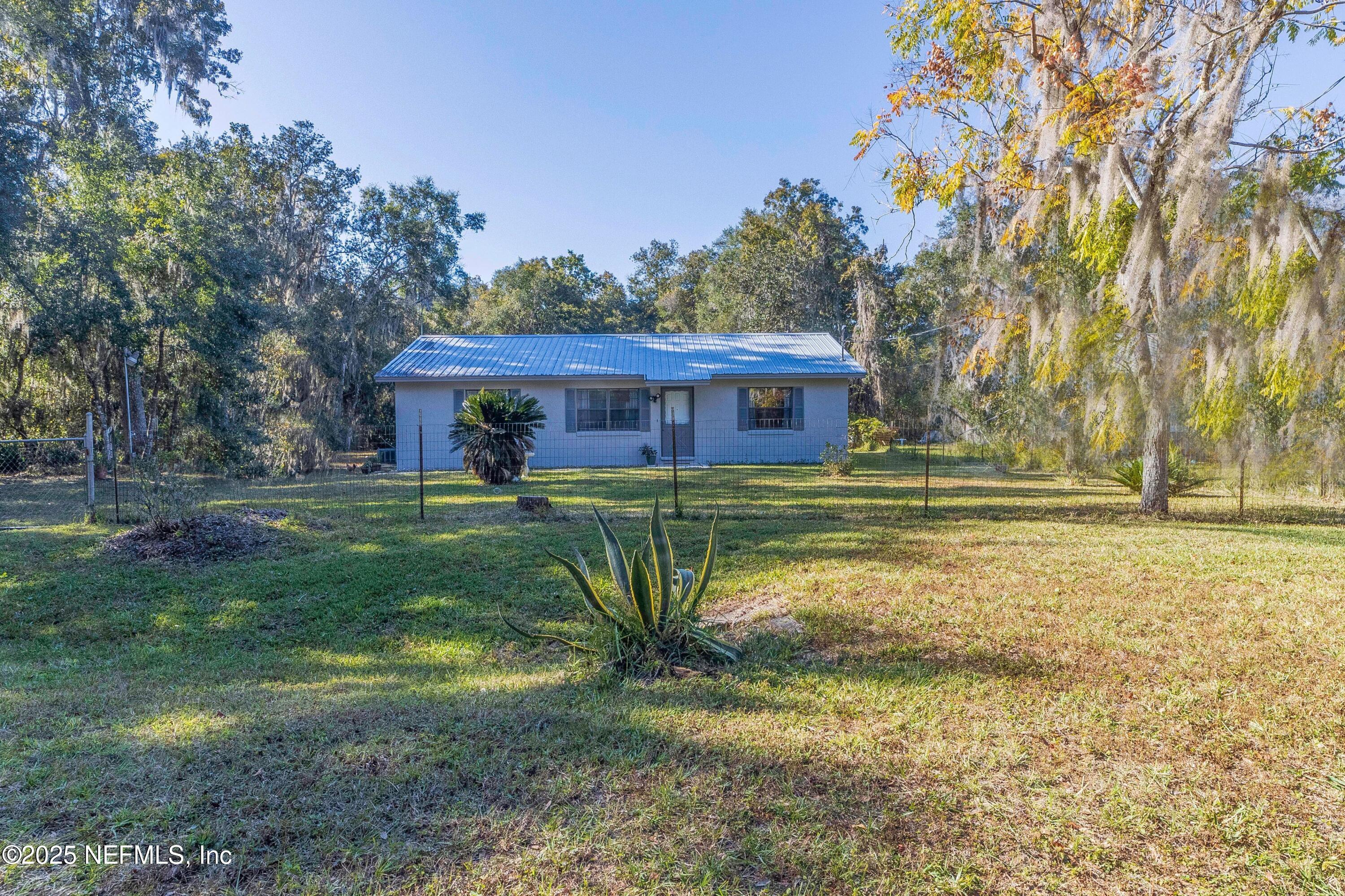 103 Indian Mound Road Satsuma, FL 32189 - Photo 2 of 36 a view of a house with a big yard