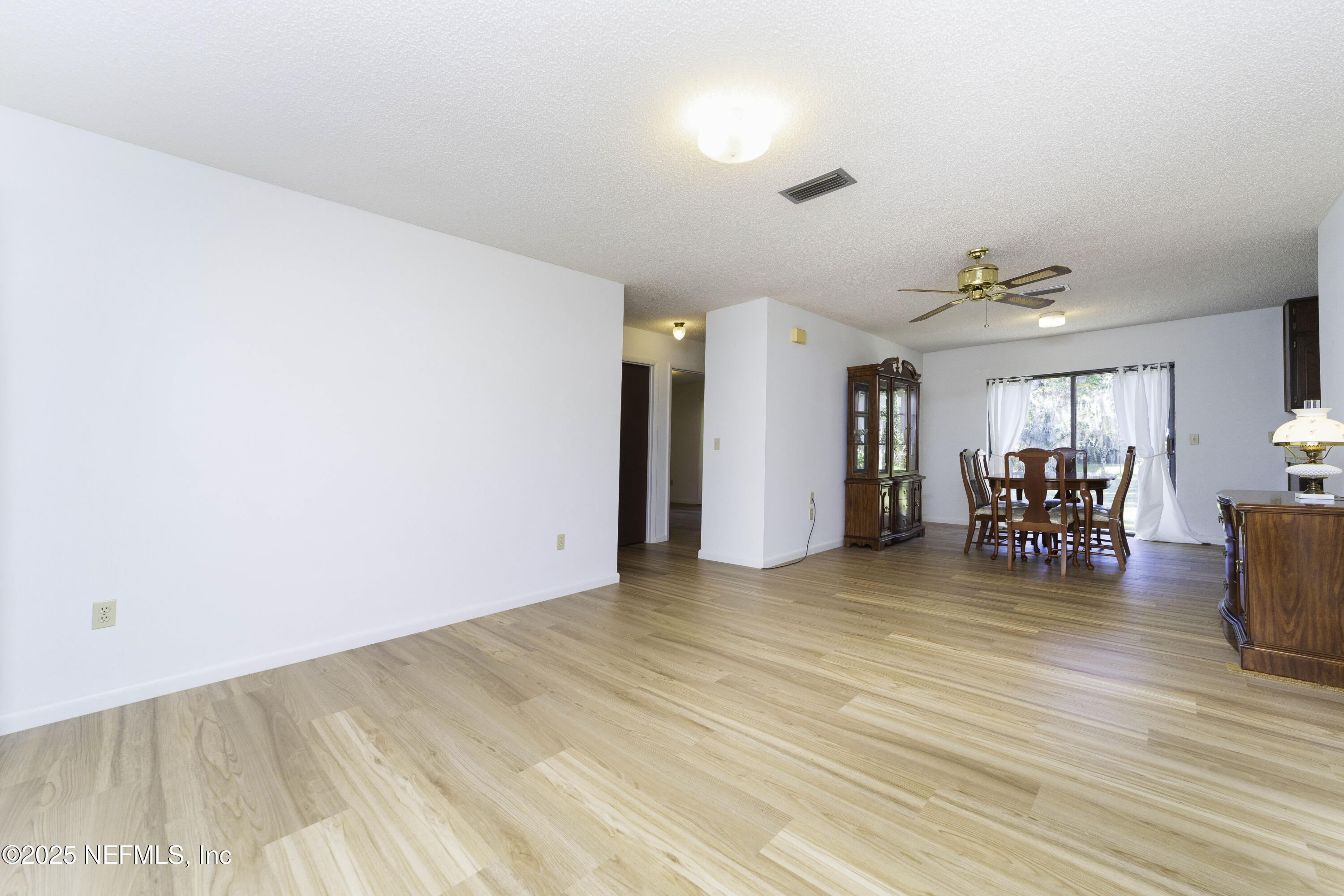 103 Indian Mound Road Satsuma, FL 32189 - Photo 7 of 36 a view of livingroom with furniture and wooden floor