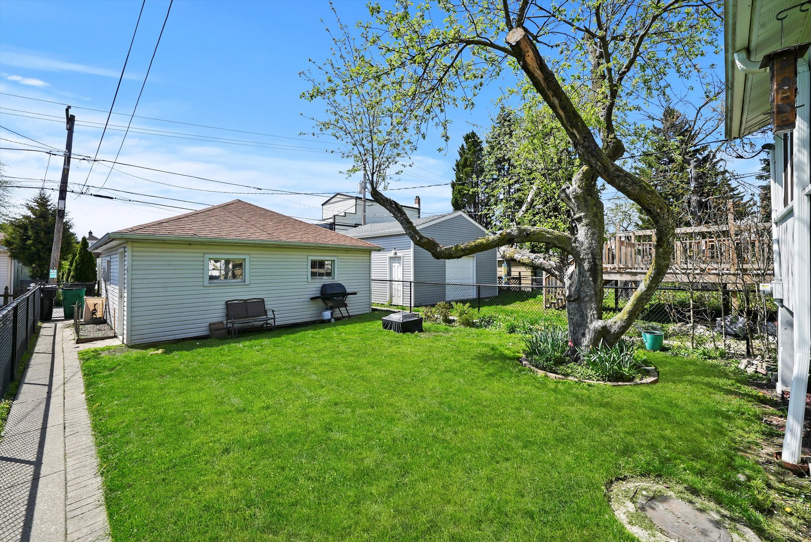 6442 27th Street Berwyn, IL 60402 - Photo 21 of 30 a front view of a house with garden