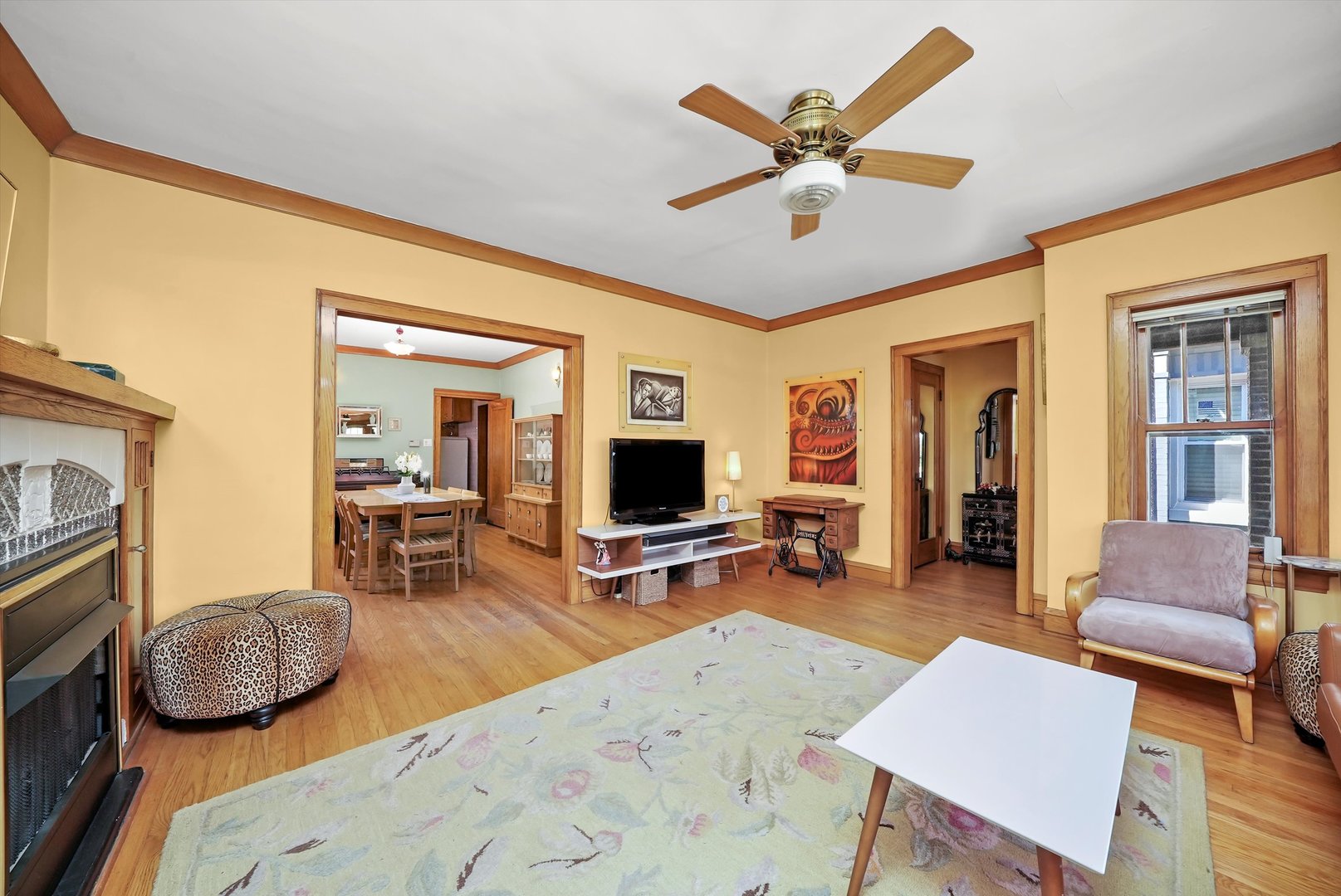 6442 27th Street Berwyn, IL 60402 - Photo 4 of 30 a living room with furniture and a flat screen tv