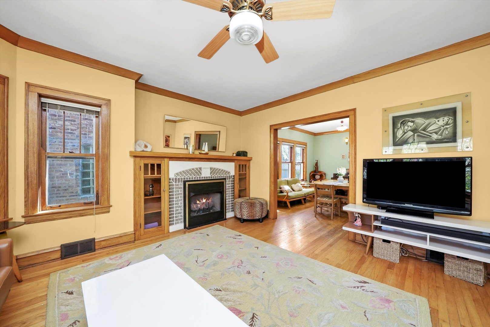 6442 27th Street Berwyn, IL 60402 - Photo 5 of 30 a living room with furniture and a flat screen tv