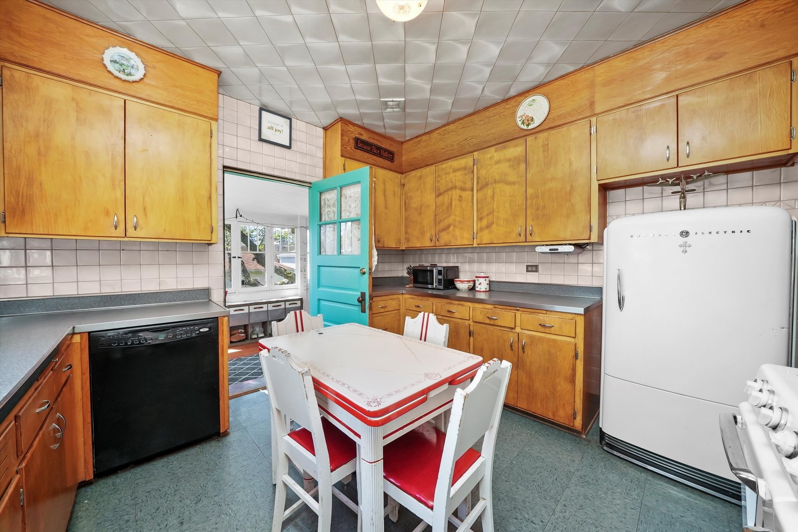6442 27th Street Berwyn, IL 60402 - Photo 8 of 30 a kitchen with stainless steel appliances granite countertop a stove a sink and a refrigerator