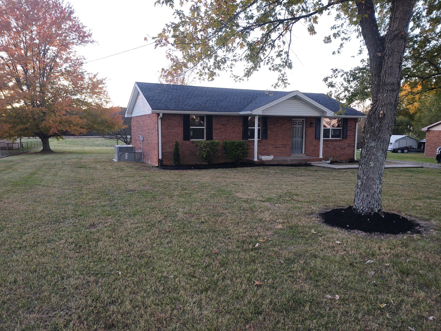 854 Jackson Road Portland, TN 37148 - Photo 2 of 11 a front view of a house with a garden