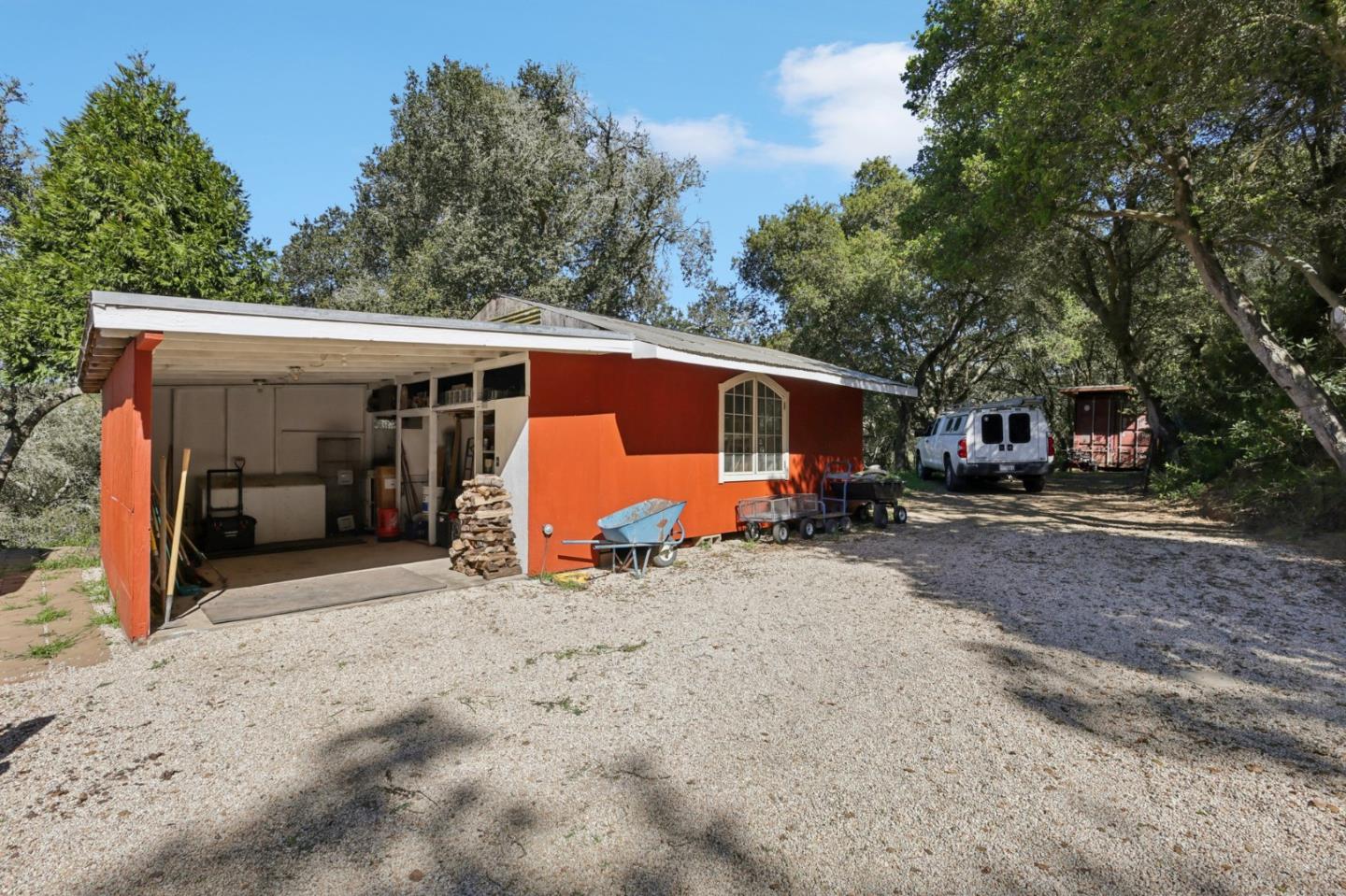 122 Strawberry Road Watsonville, CA 95076 - Photo 34 of 57 a view of a house with backyard and trees in the background