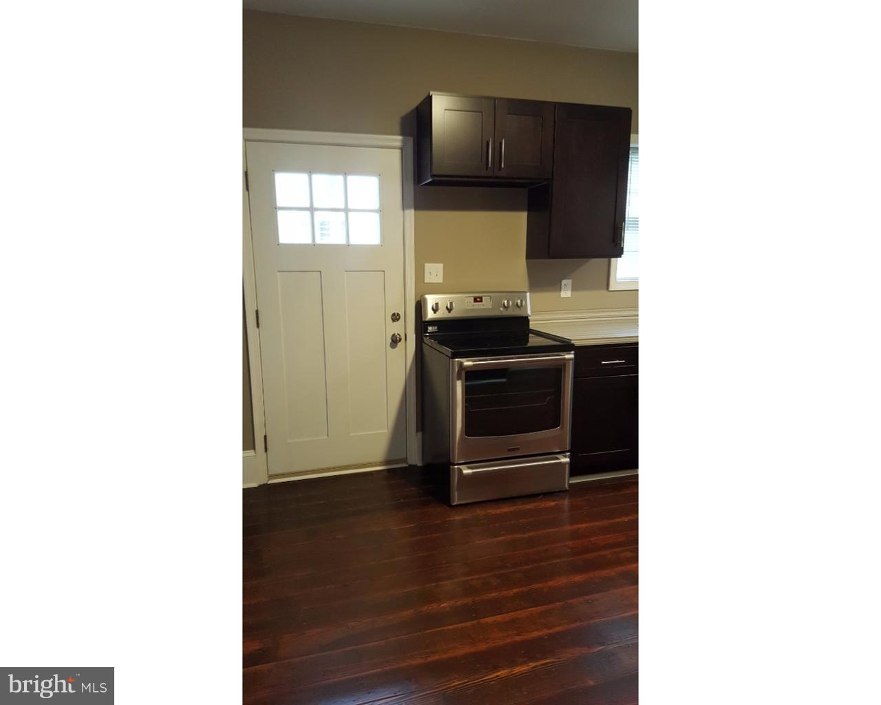 20 South Chestnut Street, Unit 1 Boyertown, PA 19512 - Photo 7 of 15 a kitchen with a sink and a stove