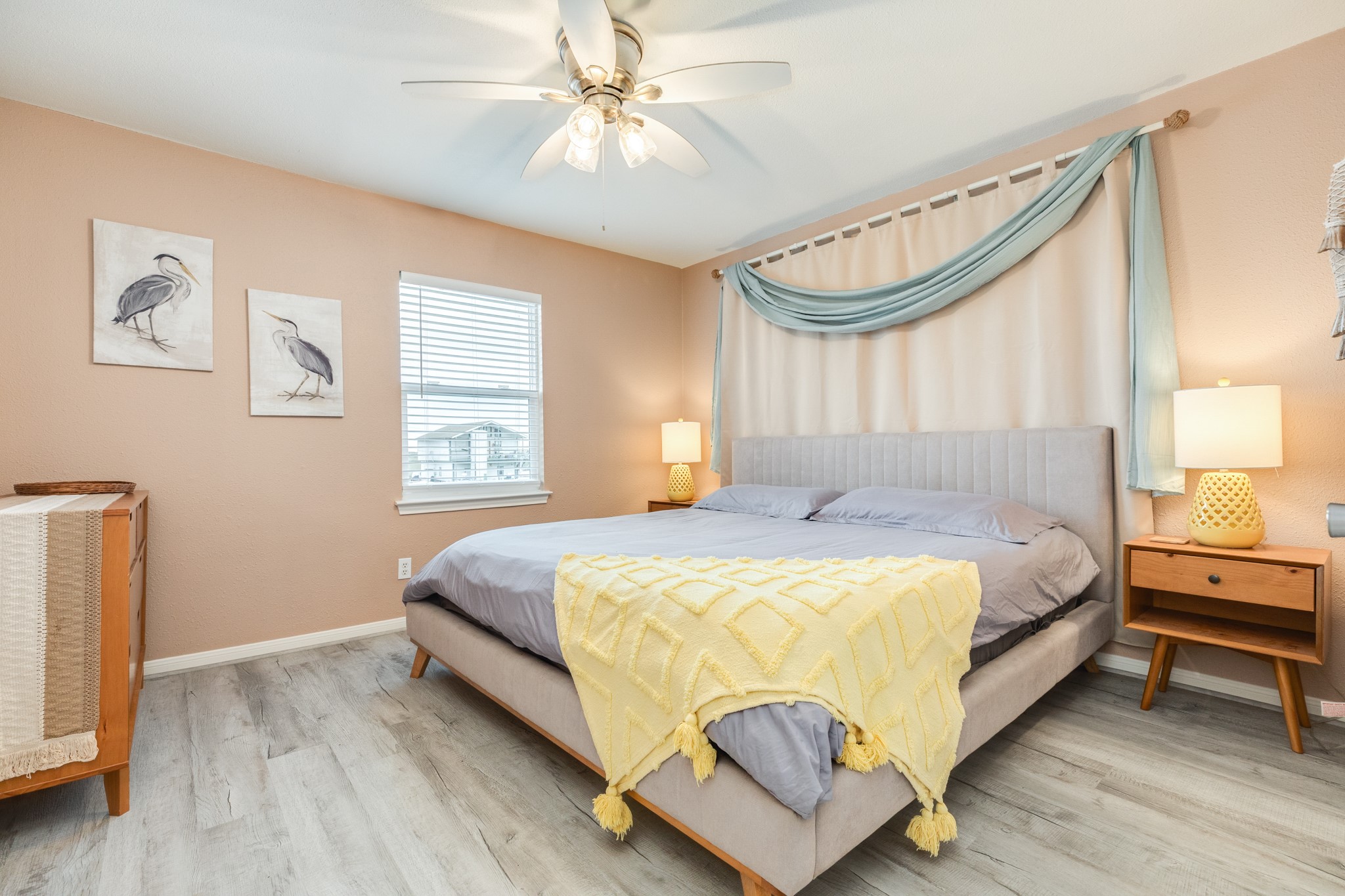 306 Pompano Lane Surfside Beach, TX 77541 - Photo 21 of 37 a bedroom with a bed and a window