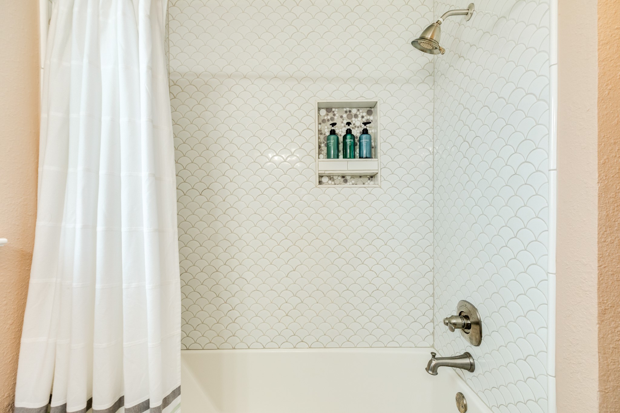 306 Pompano Lane Surfside Beach, TX 77541 - Photo 22 of 37 a bathroom with a bathtub and shower