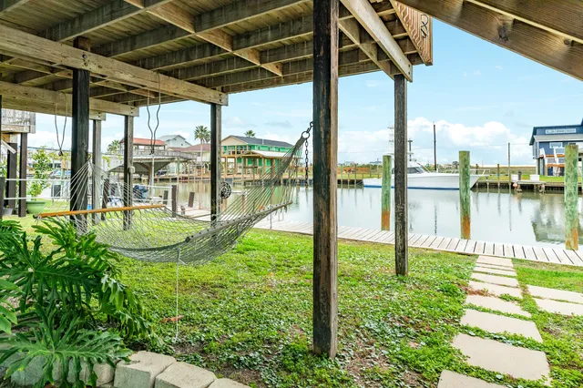 a view of a swimming pool with a porch