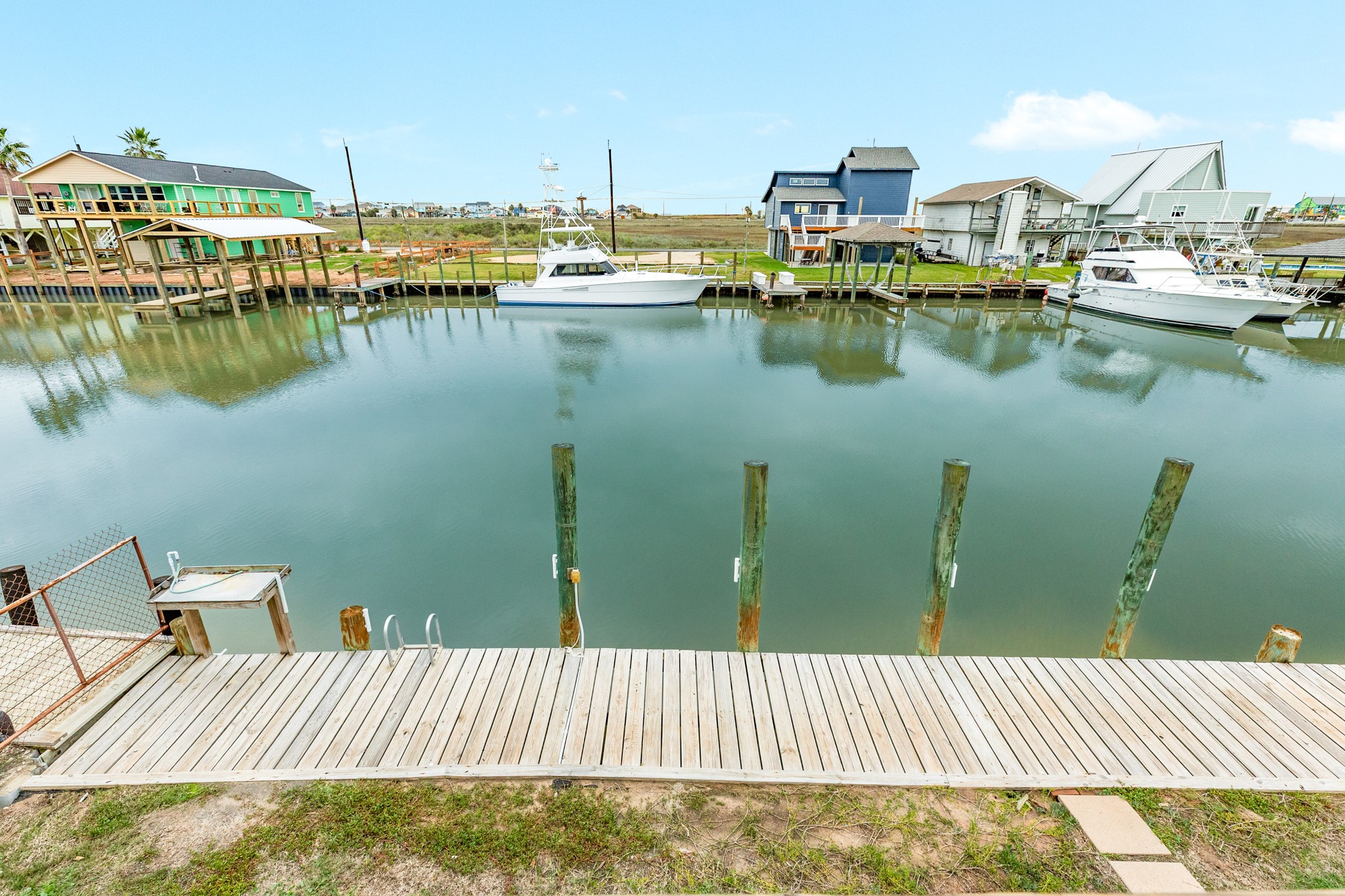 306 Pompano Lane Surfside Beach, TX 77541 - Photo 3 of 37 a view of a lake with boats